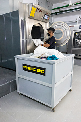  Washing machine with clothes inside.